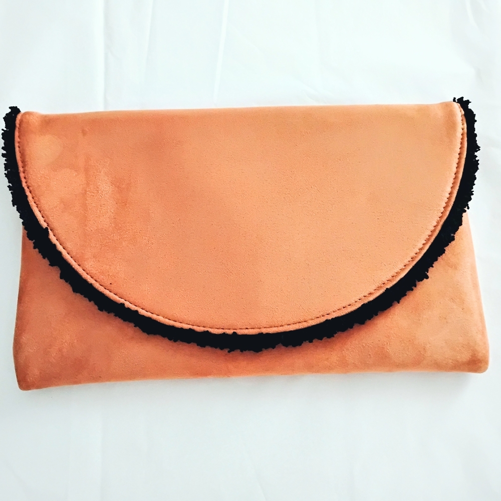 Suede Envelope Clutch in Peach with Black Trim